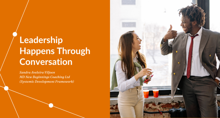 Leadership happens through conversation cover image showing two professionals in conversation, by New Beginnings Coaching